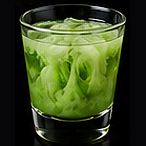Alien Secretion classic shot on a dark bar background