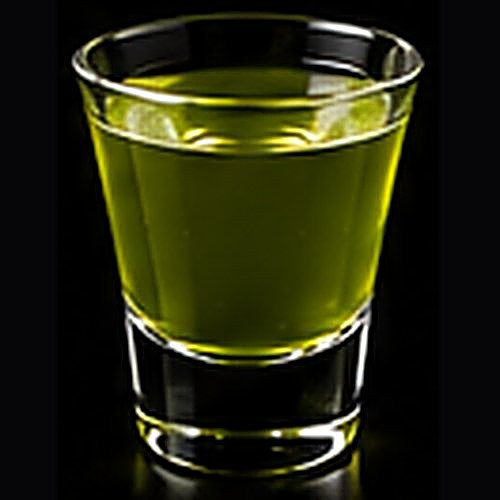 Appletini classic cocktail on a dark bar background