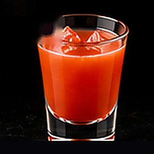 Bahama Mama classic cocktail on a dark bar background