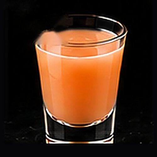 Bellini classic cocktail on a dark bar background