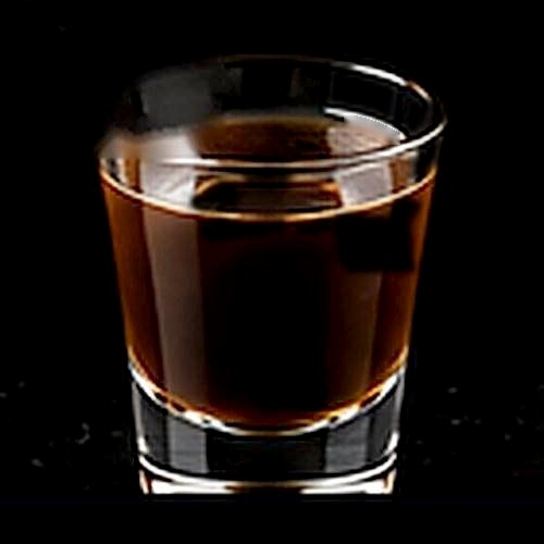 Black Russian classic cocktail on a dark bar background