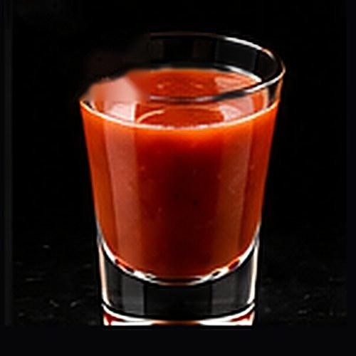 Bloody Mary classic cocktail on a dark bar background