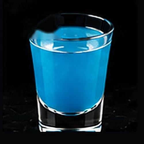Blue Hawaiian classic cocktail on a dark bar background