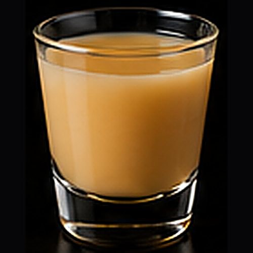 Buttery Nipple classic shot on a dark bar background