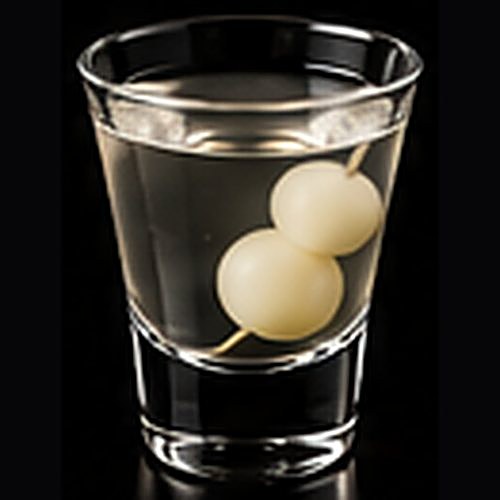 Gibson classic cocktail on a dark bar background