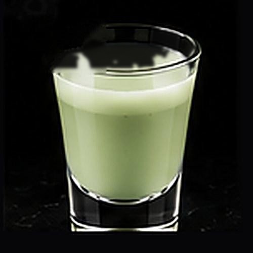 Grasshopper classic cocktail on a dark bar background