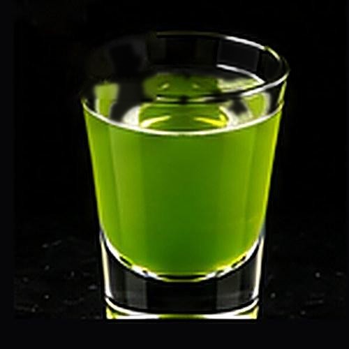 Jolly Rancher classic cocktail on a dark bar background