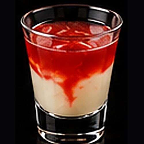 Lava Flow classic cocktail on a dark bar background