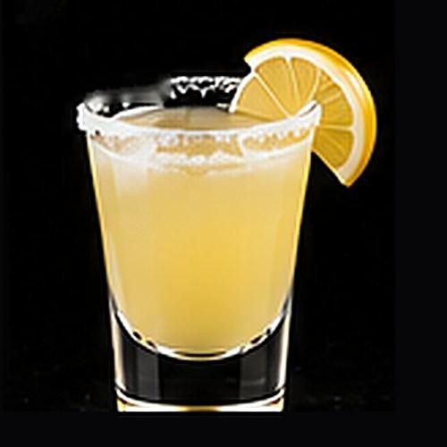 Lemon Drop Shot classic shot on a dark bar background