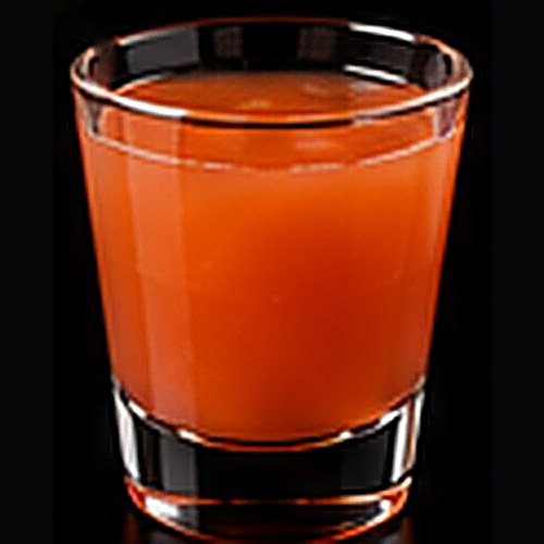 Madras classic cocktail on a dark bar background