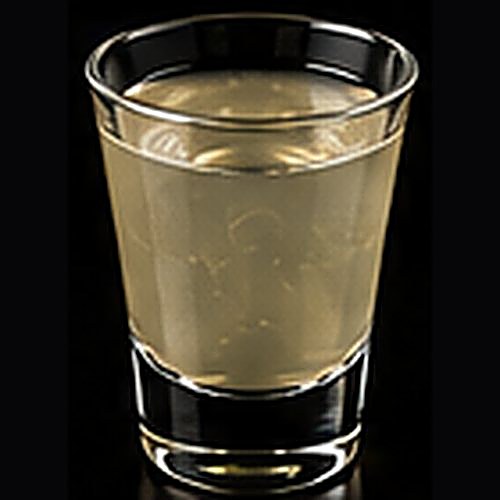 Mexican Mule classic cocktail on a dark bar background