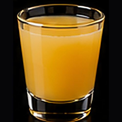 Mimosa classic cocktail on a dark bar background