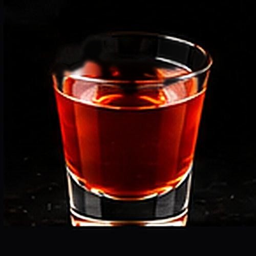 Negroni classic cocktail on a dark bar background