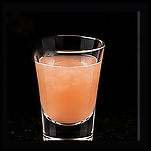 Paloma classic shot on a dark bar background