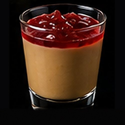 Peanut Butter & Jelly classic shot on a dark bar background