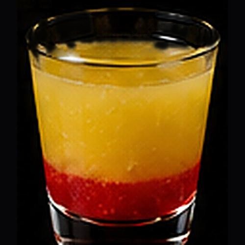 Pineapple Upside-Down Cake classic shot on a dark bar background