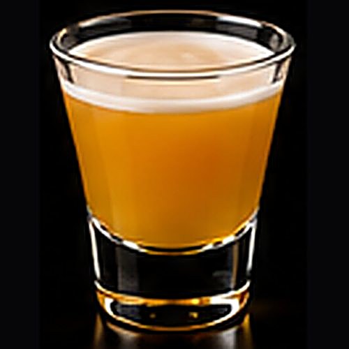Pornstar Martini classic cocktail on a dark bar background