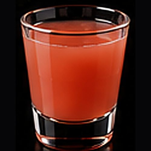 Sea Breeze classic cocktail on a dark bar background