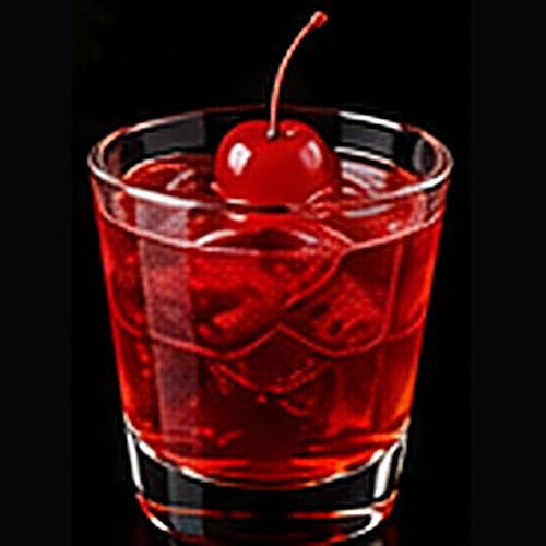 Shirley Temple booze-free classic on a dark bar background