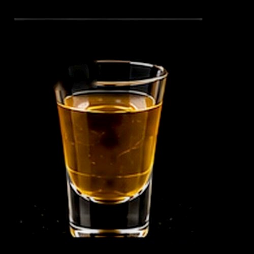Southern Comfort classic shot on a dark bar background