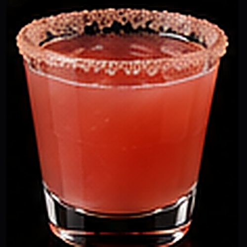 Strawberry Margarita classic cocktail on a dark bar background