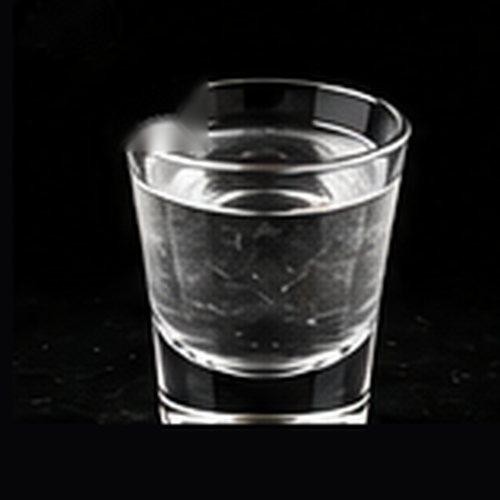 Vodka Soda classic cocktail on a dark bar background