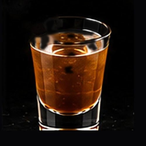 Zombie classic cocktail on a dark bar background