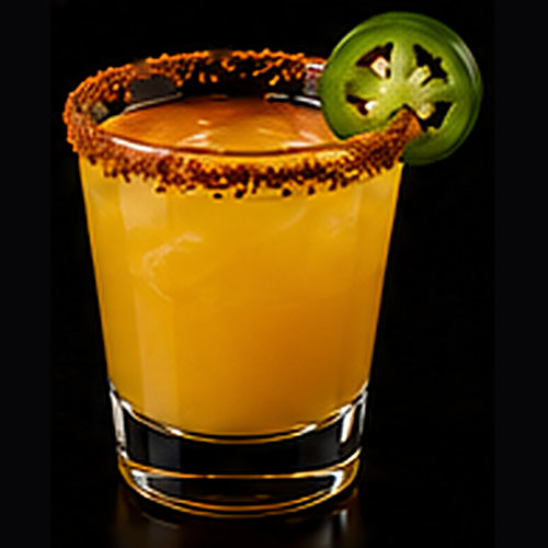 Spicy Man-Go served in a rocks glass with cayenne sugar rim on a dark bar background