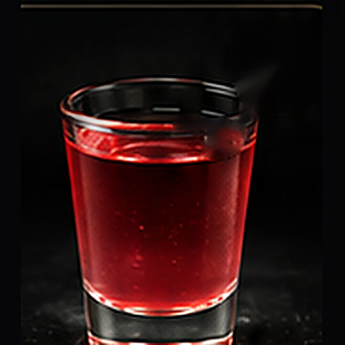 Wednesday Flavored Bomb served as a wednesday special with energy-drink bomb presentation on a dark bar background