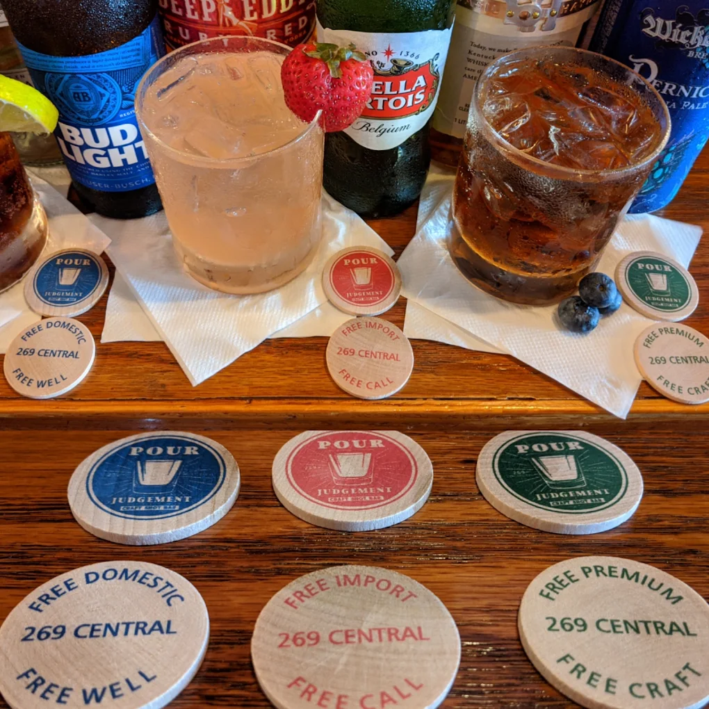 Pour Judgement free drink tokens — blue, red and green